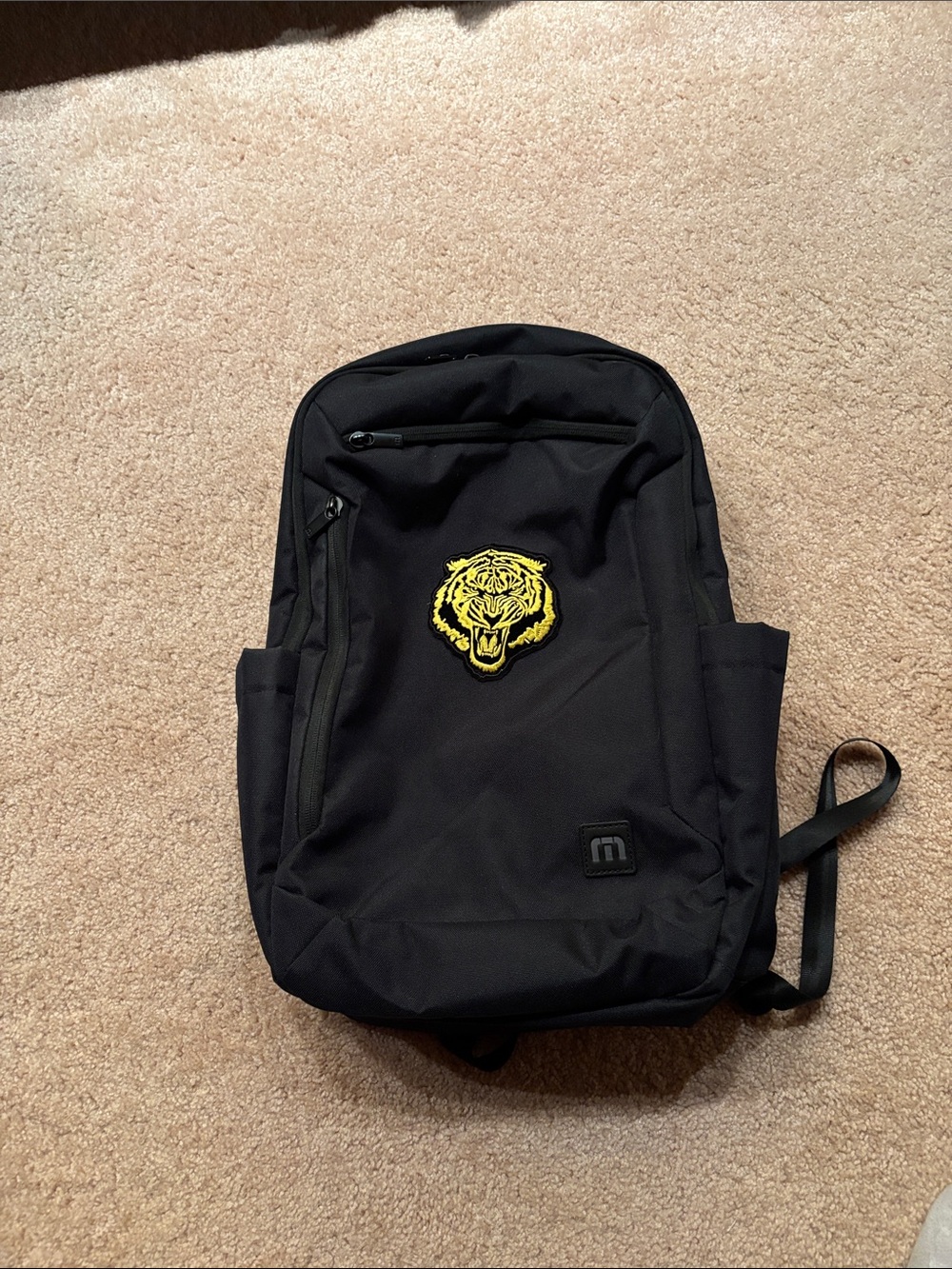 Brand New w/tags - Travis Mathew  black Duration backpack w/ yellow Tiger Patch